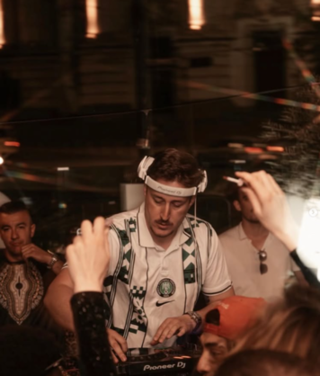 CAITAS mixing at the decks in a club
